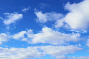 Fototapeta premium Beautiful blue sky and white cumulus clouds. Background. Scenery.