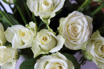 Beautiful bouquet of white roses flowers. Top view. Close-up. Background. Texture.
