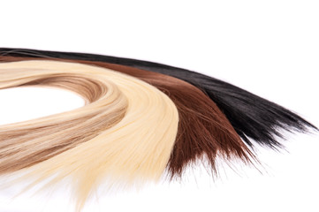 Long hair extensions in natural colors. Black, brown, blonde, and blonde balayage.