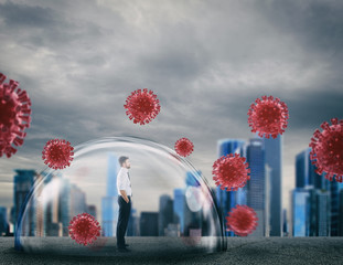 Businessman safely inside a shield dome that protects him from virus. Protection and safety concept