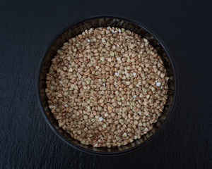 Buckwheat photographed against a black background