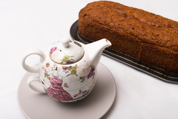 Carrot cake freshly brewed and tea cup for breakfast