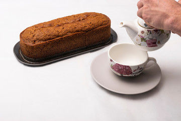 Carrot cake freshly brewed and tea cup for breakfast
