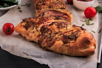 Stromboli. Stromboli is like a rolled pizza.
