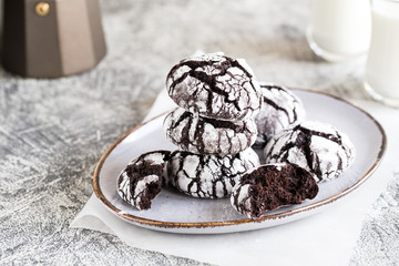 chocolate cookies. homemade chocolate crinkles cookies powdered sugar with milk