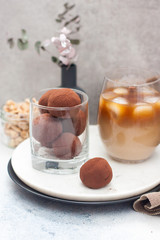 Cold coffee liqueur with chocolate truffles, rolled in cocoa powder