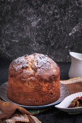 Homemade Easter cake. Easter cake on a dark background. Panettone. Easter recipe.