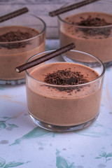 Obraz na płótnie Canvas Healthy Chocolate Mousse. Keto Chocolate Mousse. Chocolate Avocado Banana Pudding deliciously rich and creamy mousse.