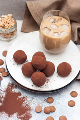 Cold coffee liqueur with chocolate truffles, rolled in cocoa powder