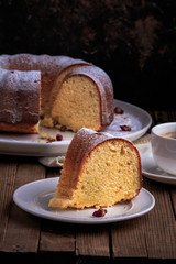 Bundt Cake perfect for parties, breakfast or dessert. Classic Vanilla Bundt Cake. Lemon Butter Bundt Cake served with cup of coffee.
