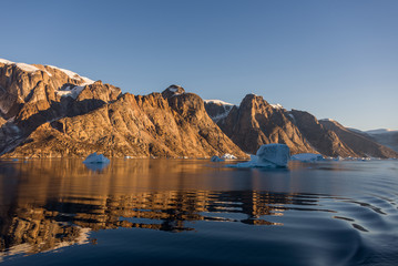 Fototapeta na wymiar Beautiful landscape with iceberg in Greenland at summer time. Sunny weather.