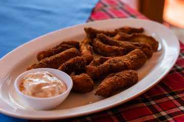 Fish Finger batter fry served with dipping sauce, Indian seafood starters 