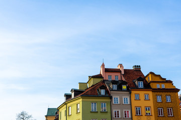 Warsaw, Poland - 18/ 03/ 2020:. Beautiful multi-colored houses in the old town in Warsaw. The central streets of the historic center of Warsaw. The main tourist attraction of Warsaw. 