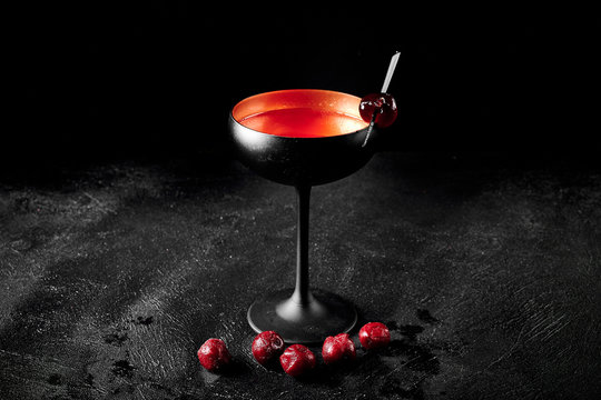 cocktail on a black background, assorted cocktails, minimalism in cocktails