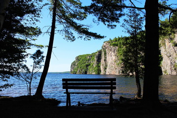 Bon Echo Provincial Park landscape image with bench silhouette in Ontario, Canada.