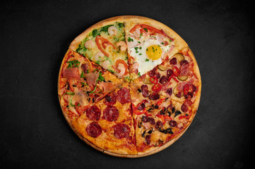 pizza on a black background, assorted in one pizza, assorted pizza