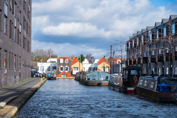 Fototapeta premium Boats moored in a canal in New Islington newly developed area in Manchester