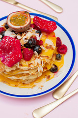 Coconut pancakes with passion fruit