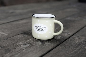 cup of coffee on wooden table