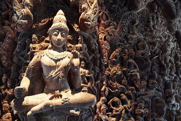 Sanctuary of Truth (or Prasat Sajja Tham) is religious sanctuary under construction, its all wood building filled with traditional sculptures in Pattaya, Thailand