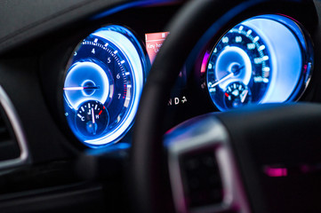 Luminous modern car dashboard in blue