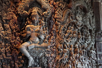 Sanctuary of Truth (or Prasat Sajja Tham) is religious sanctuary under construction, its all wood building filled with traditional sculptures in Pattaya, Thailand