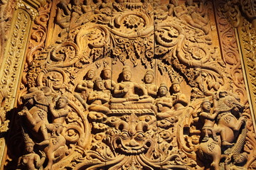 Wood carving art in sanctuary of Truth (or Prasat Sajja Tham), it's all wood building filled with traditional sculptures at Pattaya, Thailand