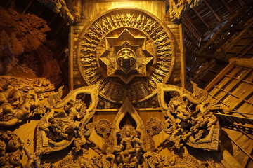 Wood carving art in sanctuary of Truth (or Prasat Sajja Tham), it's all wood building filled with traditional sculptures at Pattaya, Thailand