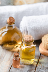 Concept of using natural oil in cosmetology. Moisturizing skin care and aromatherapy. Gentle body treatment with a brush. Atmosphere of harmony, relax and pleasure. Luxury lifestyle 