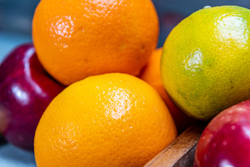 red and green apples oranges and tasty tangerines along with other fruits