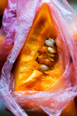 Raw pumpkin pieces in plastic bags, zero waste, smart consuming