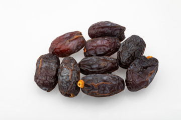 dark brown dates on a white background
