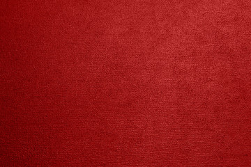 Red textured background with a gradient.