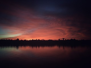 twilight scenery ( senja ) on the digul river - papua indonesia