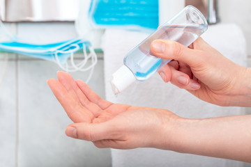 Coronavirus protection hand hygiene. Woman use hand sanitizer. Alcohol gel antibacterial soap sanitizer, hands disinfection. Hygiene protection Coronavirus Covid 19. Skin disinfectant for healthcare