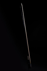 Cello bow closeup isolated on black background