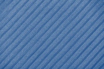 toned in trendy color 2020 year classic blue plisse background. geometric cloth lines. Fabric, textile close up.