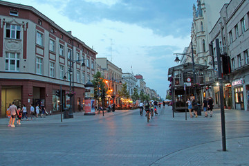 Obraz premium People go on streets of Polish city of Lodz