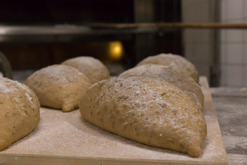 Raw bread loafs, ready to be cooked