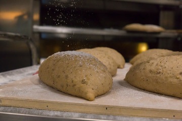 Raw bread loafs, ready to be cooked