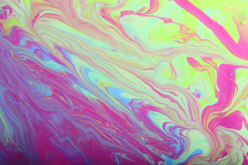 Marble background in pastel colors.Beautiful stains of liquid nail polish,fluid art technique.Pour painting art work.Modern backdrop.Good for placing text or design.Modern web banner.