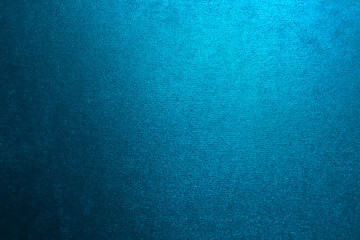 Turquoise Blue Metallic textured background with a gradient.