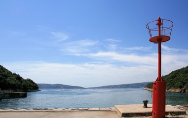 light house in small port of Valbiska, island Krk, Croatia