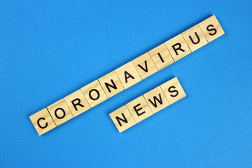 The inscription coronavirus news on blue background. Dangerous 2019-nCov flu infection