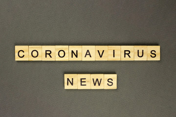 The inscription coronavirus news on gray background. Dangerous 2019-nCov flu infection