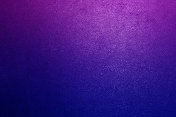 Multi-colored metal textured background with a gradient.