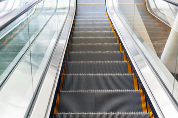 Empty escalator stairs in a mall or subway