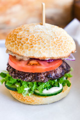 powerful burgers with juicy cutlets, fresh vegetables and crispy buns.
