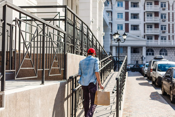 Man Delivering Online Grocery Order