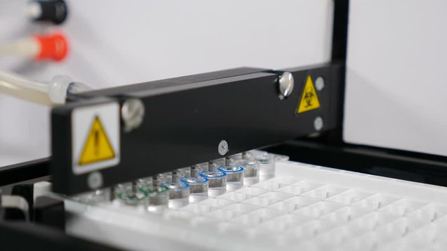 Automated DNA Processor real-time PCR cycler. PCR robotic machine for molecular and genetic research laboratory. 4 k footage
